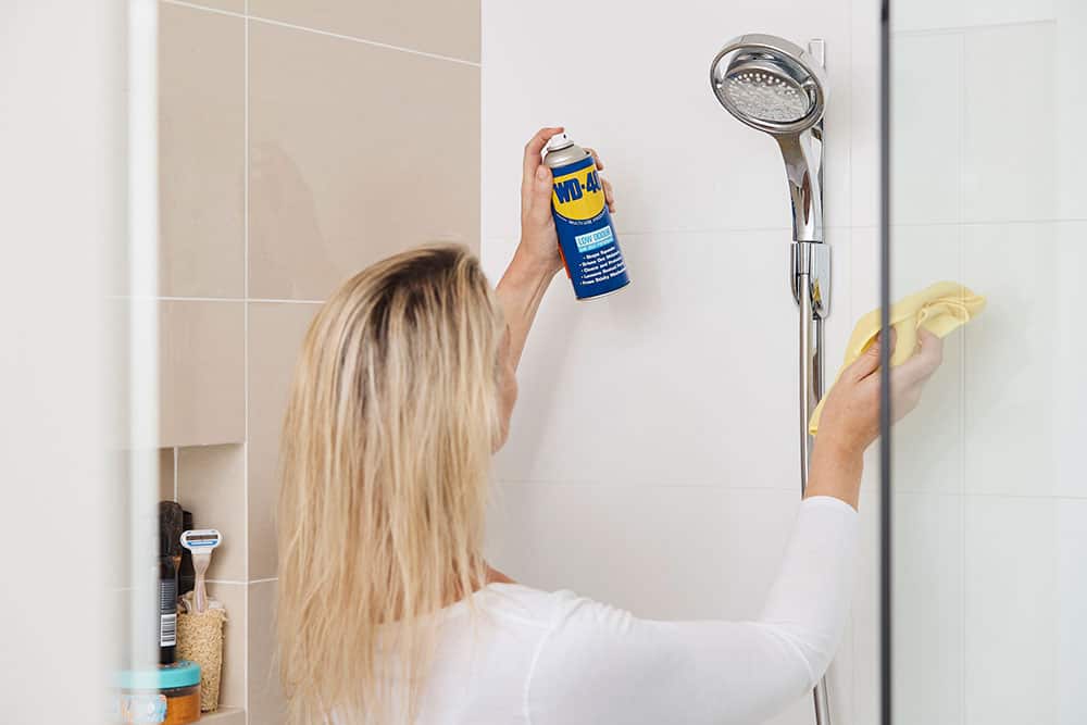 How to remove hard water stains from glass shower doors - WD-40 Australia